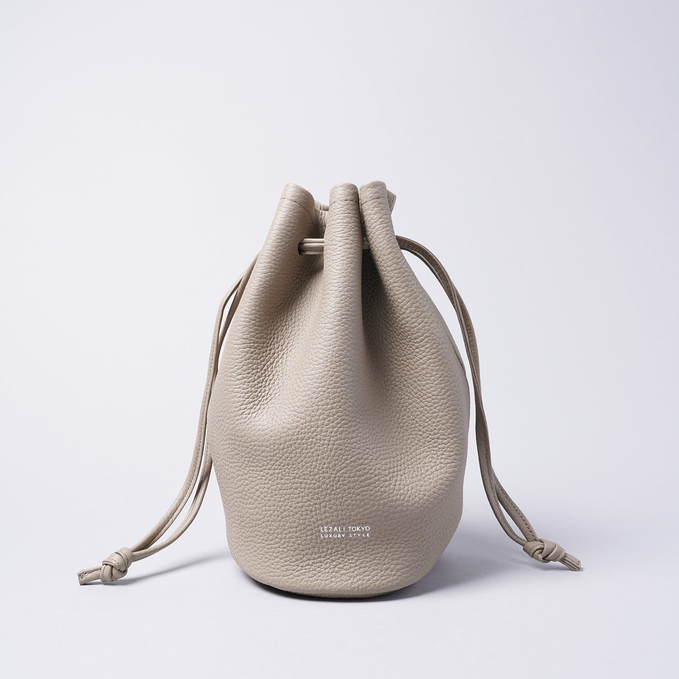 <LEZALI> Embossed Leather Draw String Mini Bag / Gold